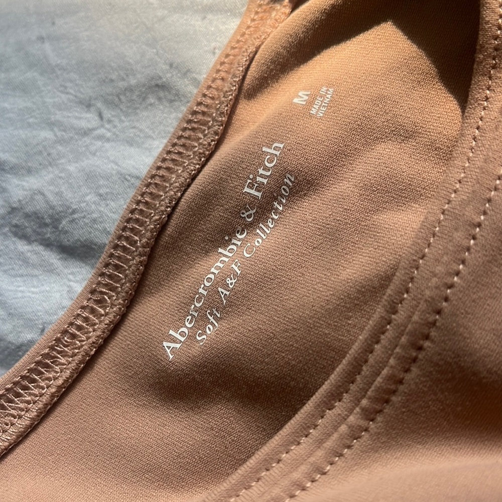 Nude A and F soft collection body suit